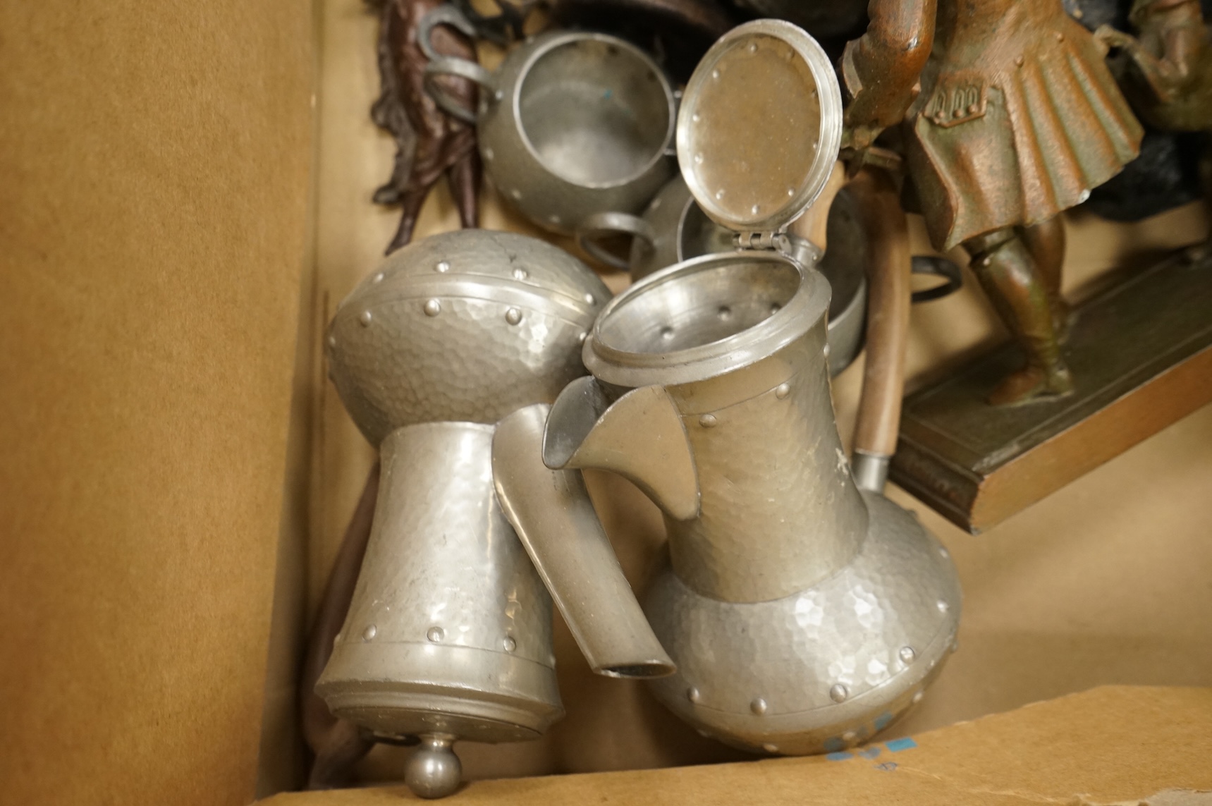 An Arts & Crafts pewter teaset and tray and a collection of mixed metalware